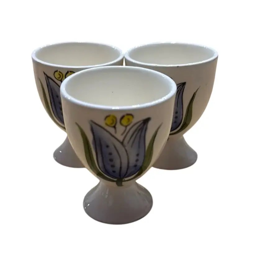 Three vintage Roullet Renoleau egg cups from Charente, France