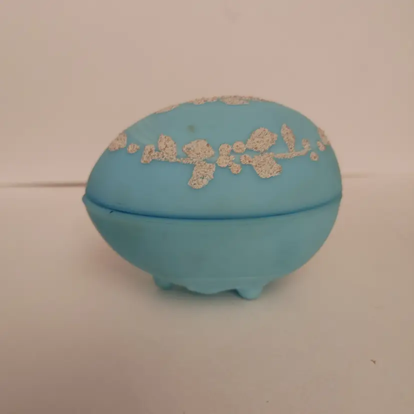 Westmoreland Light Blue Mist Satin Egg trinket box with white flower. 3w x 3h x 4d. No chips or cracks.