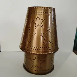 Rustic Punched Tin Candle Holder. 8 inches high.
