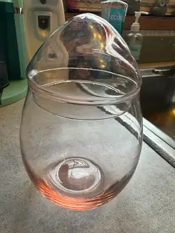 Glass egg-shaped jar by Libbey. Pink Tinting.