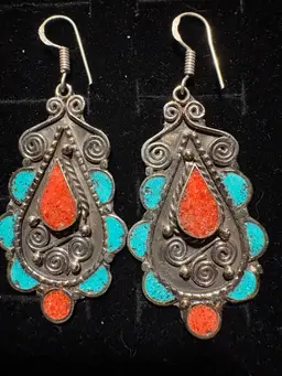Handmade Tibetan silver earrings with coral and turquoise inlay.