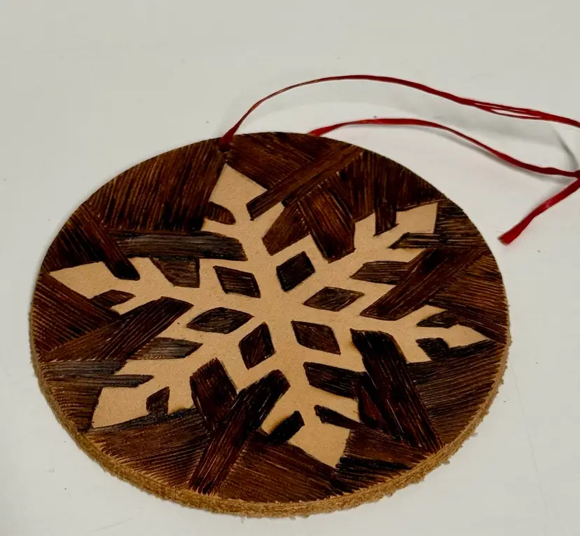 Wood Burned Pyrography Snowflake Ornament on leather