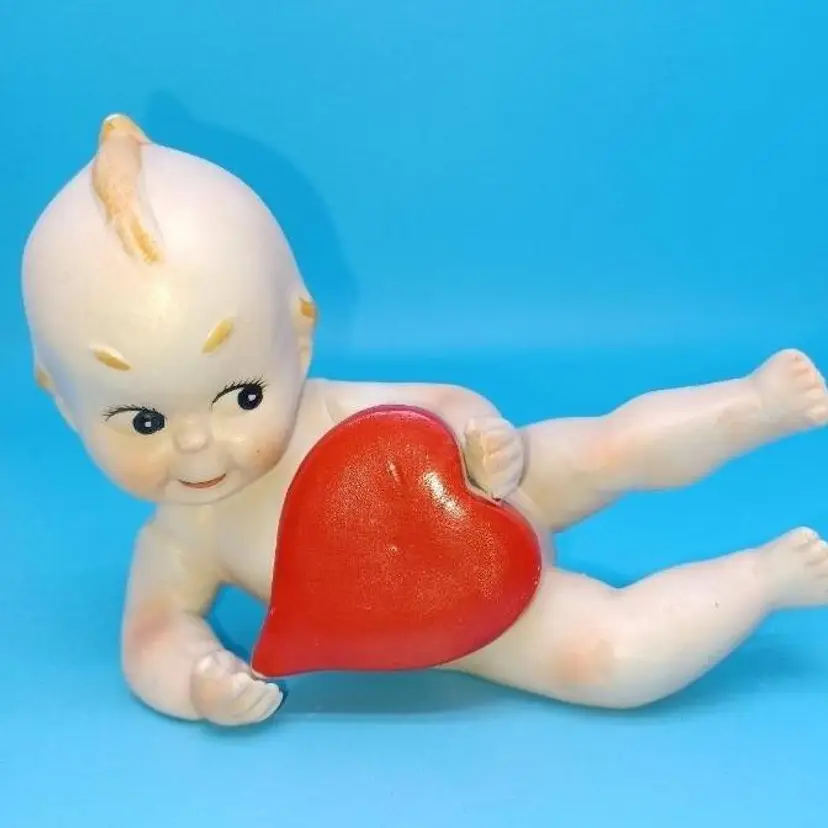 Vintage Bisque Kewpie Figurine with Large Heart