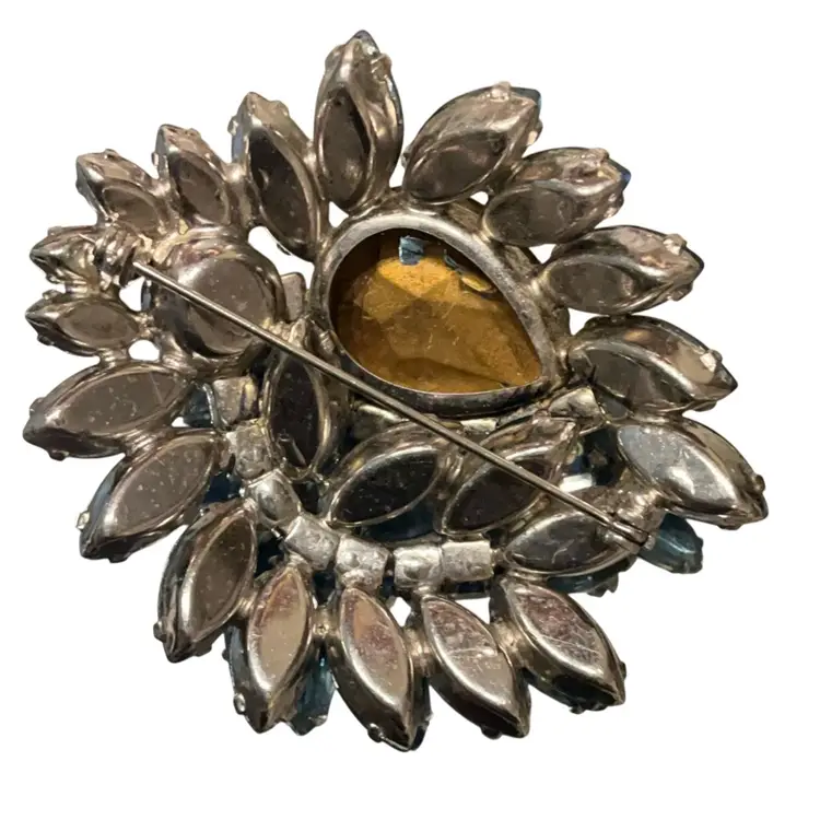 VTG Brooch With Blue Sapphire Colored Stones And Light Blue AB Smaller Stones