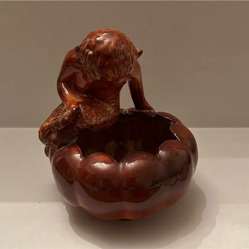 Niloak signed pottery planter in brown glaze