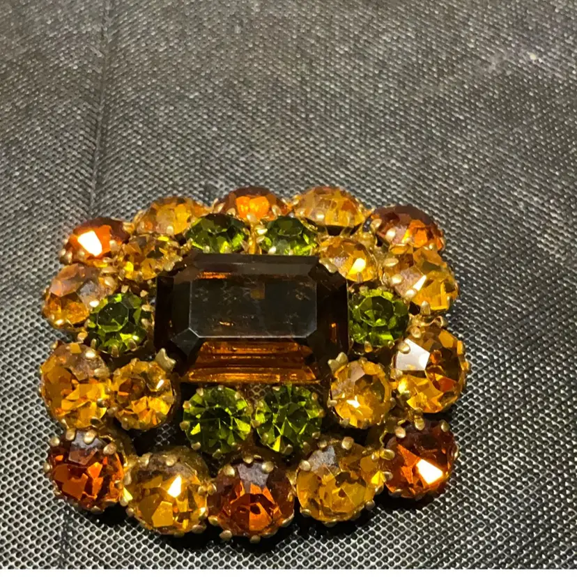 VTG Olivine And Amber Rhinestone Brooch Made In Austria. Measures 1.75” X1.5”