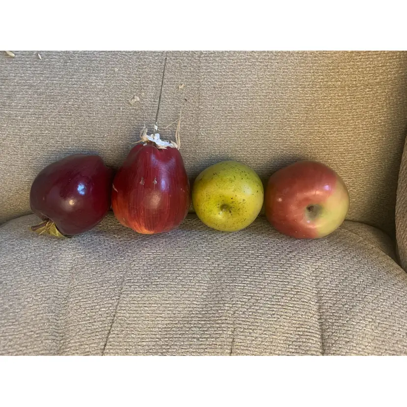 4 Apples One On A Pick up