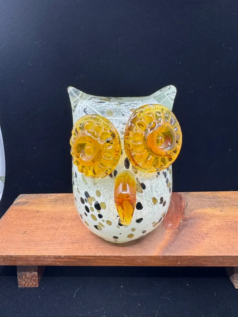 Hand-blown art glass owl figurine with amber eyes and speckled body, 5”