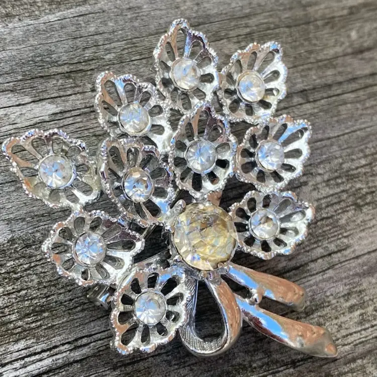 Unsigned bridal brooch- silver tone with White rhinestones And Yellow Center Rhinestone 