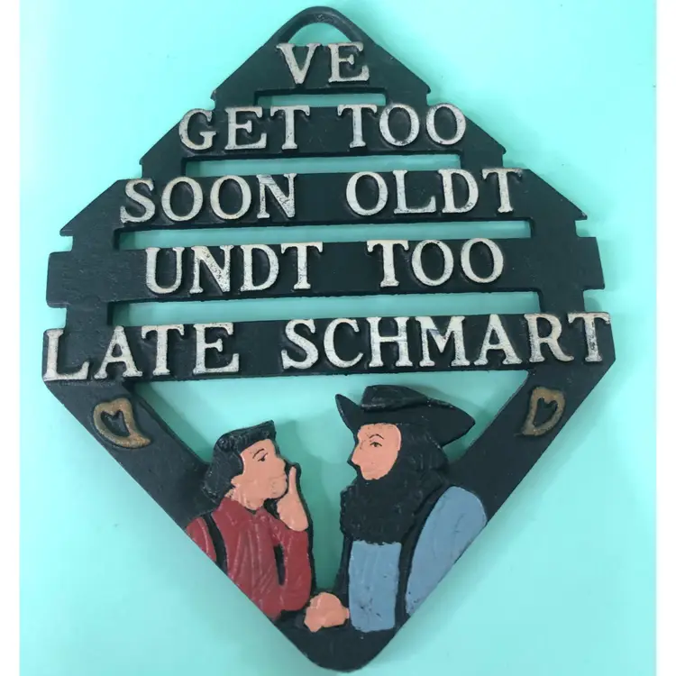 Vintage Cast Iron Amish Pennsylvania Dutch Trivet "Ve Get Too Soon Undt Too Late Schmart"