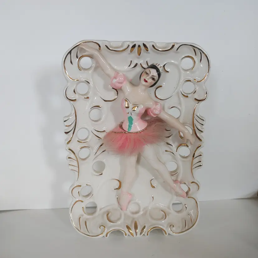 Enesco Imports. Ballet Dancer in pink fur tutu. Wall Pocket. Minor paint loss. No chips. 8 inches high.