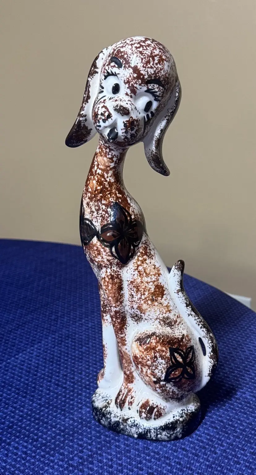 Hawaiian “HAWAII” Ceramic Dog Figurine 
 11.75” tall cream brown black