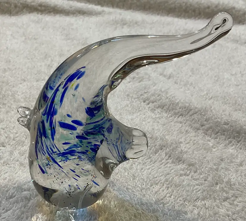 Clear and blue blown glass fish or is it a bird?  It is signed. 4” tall and 3” wide.
