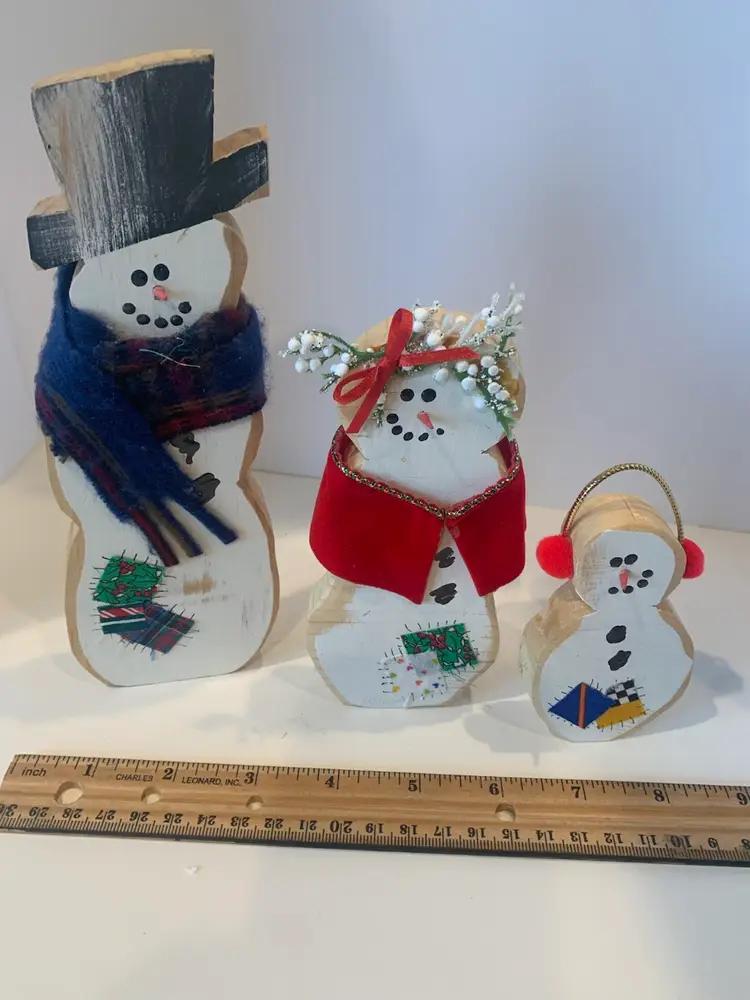Handcrafted Wooden Snowman Family