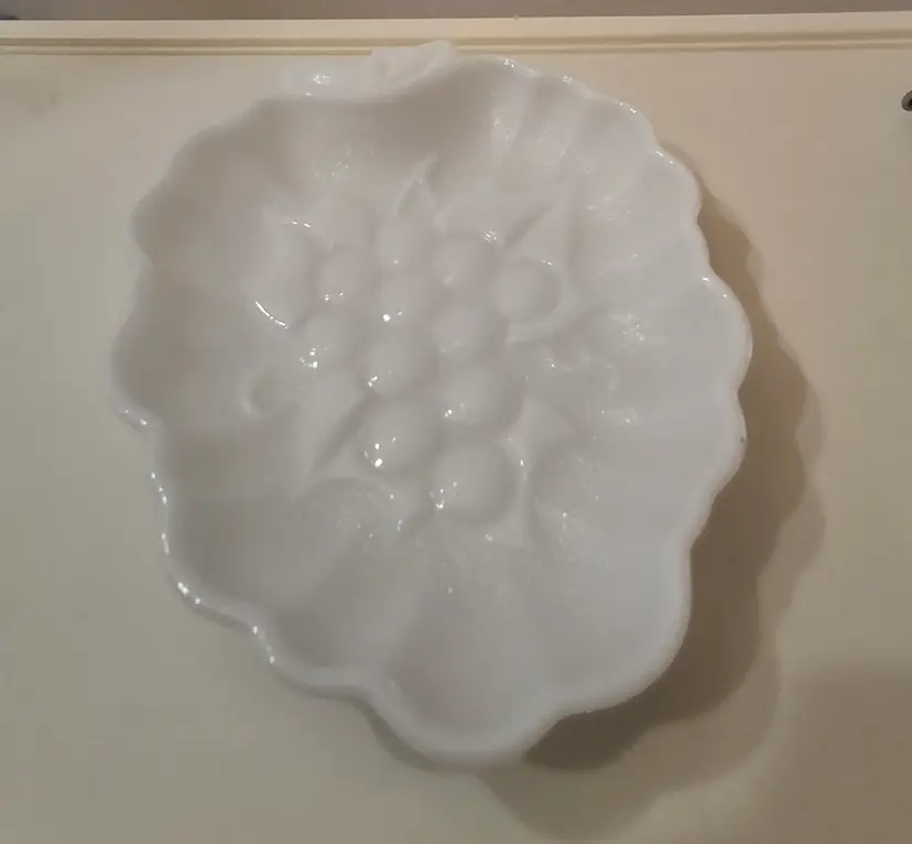 Hazel-Atlas milk glass grape shaped, glossy finish.
