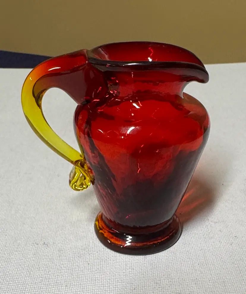 Kanawha Amberina glass mini pitcher
hand-blown 3.25” tall glows