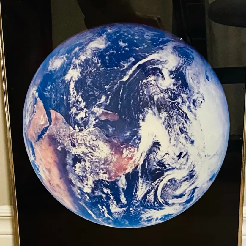 Framed print of the iconic "Blue Marble" photograph of Earth 1972