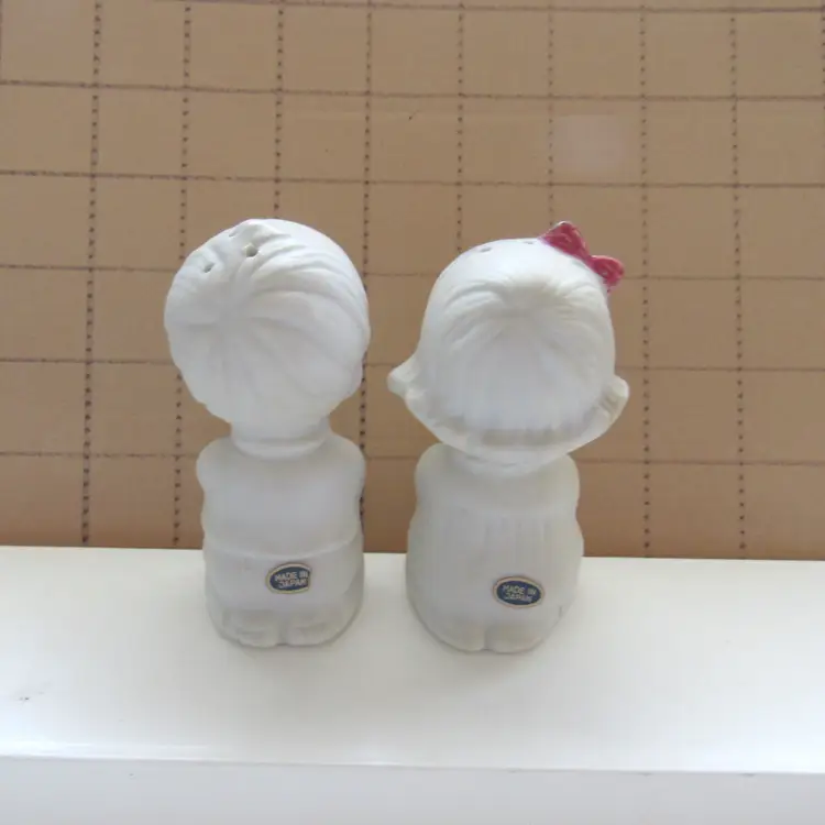 Bisque Praying Boy & Girl w/Black Hair and Bow Salt and Pepper Shaker Set