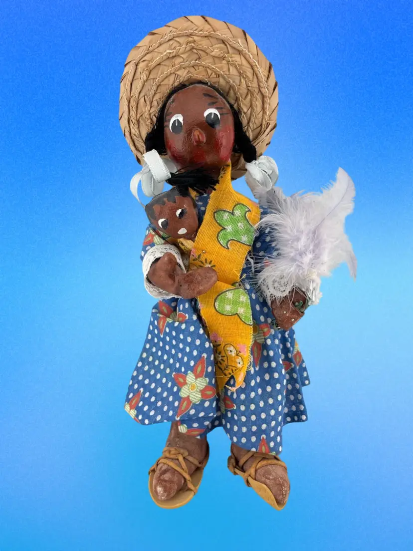 Mexican Folk Art Paper/Fabric Mache, Mom holding baby-and also holding feathers.