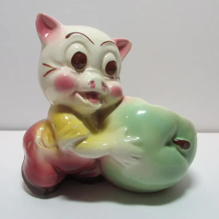 vintage Shawnee ceramic anthropomorphic pig with a green apple planter holder farm country decor