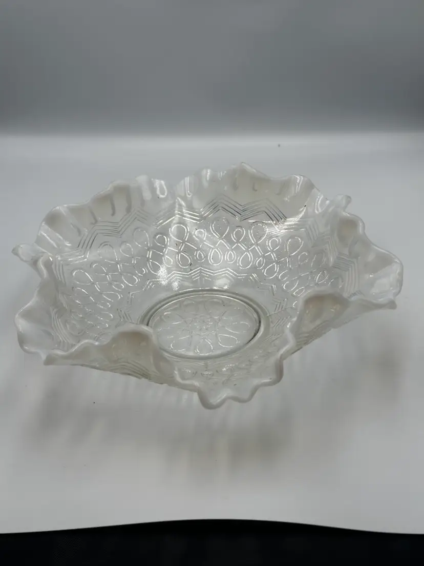 A08 Jefferson Glass opalescent glass bowl with a ruffled crimped edge.