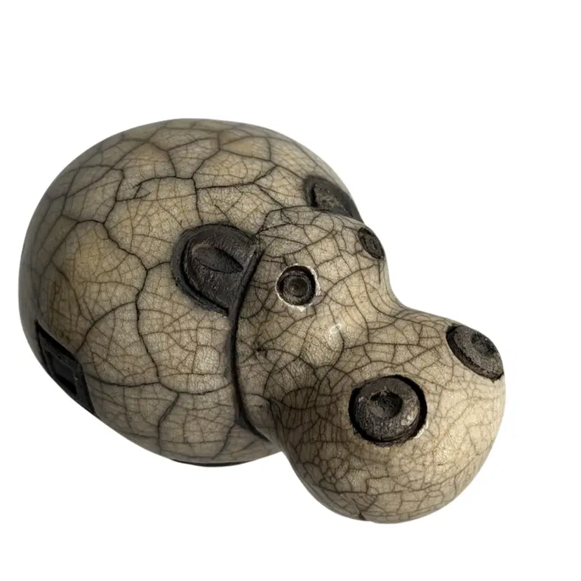 Vintage Hippopotamus Figurine  Beige & Brown Crackled Raku-Crazy Clay Stamped “Hand Made In South Africa” & Makers Mark
2” T x 4” L x 2-1/4” W