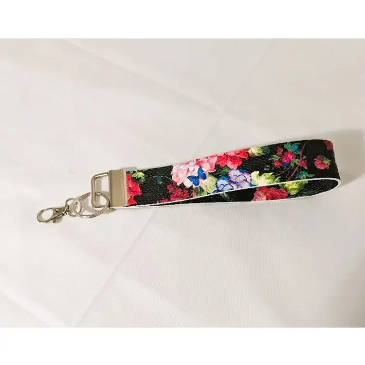 Handmade Faux Leather Wristlet Key Chain / Fob.  Black with bright printed florals.