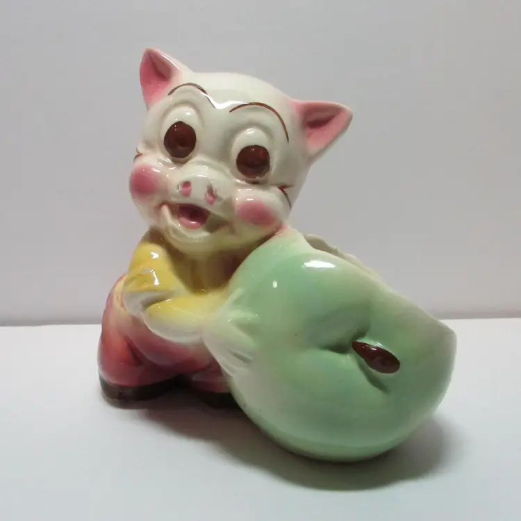 vintage Shawnee ceramic anthropomorphic pig with a green apple planter holder farm country decor