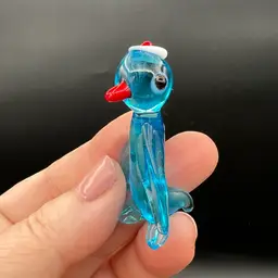 009. Adorable Derpy Glass Penguin