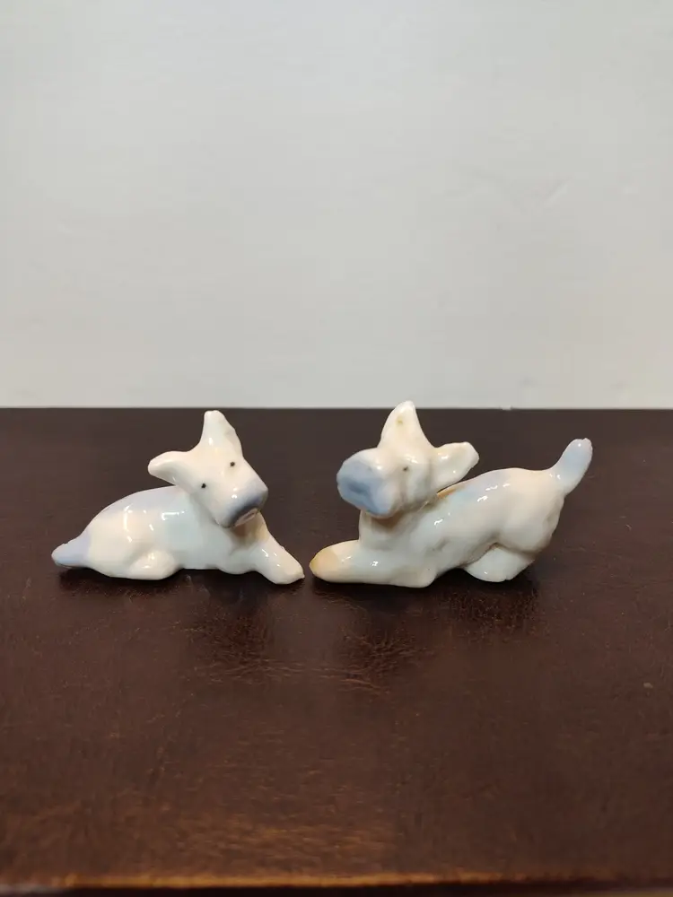 Pair Of Blue & White Glazed Dogs