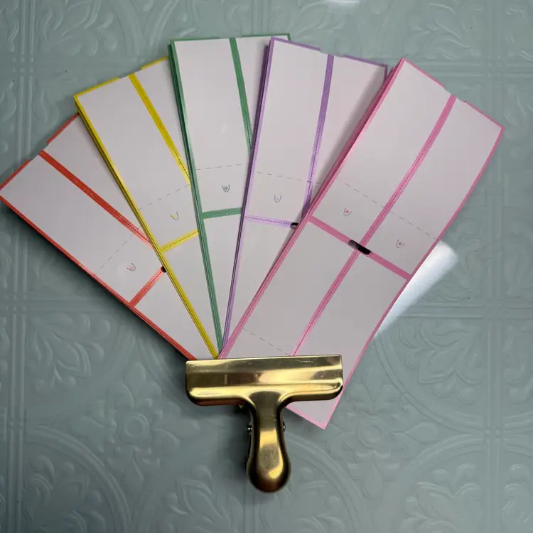 A Rainbow Of Unprinted, Thermal, Retail Clothing Tags