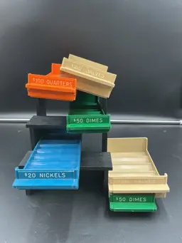 Plastic coin trays. Bright colors. Great for your jewelry display or coin collection.