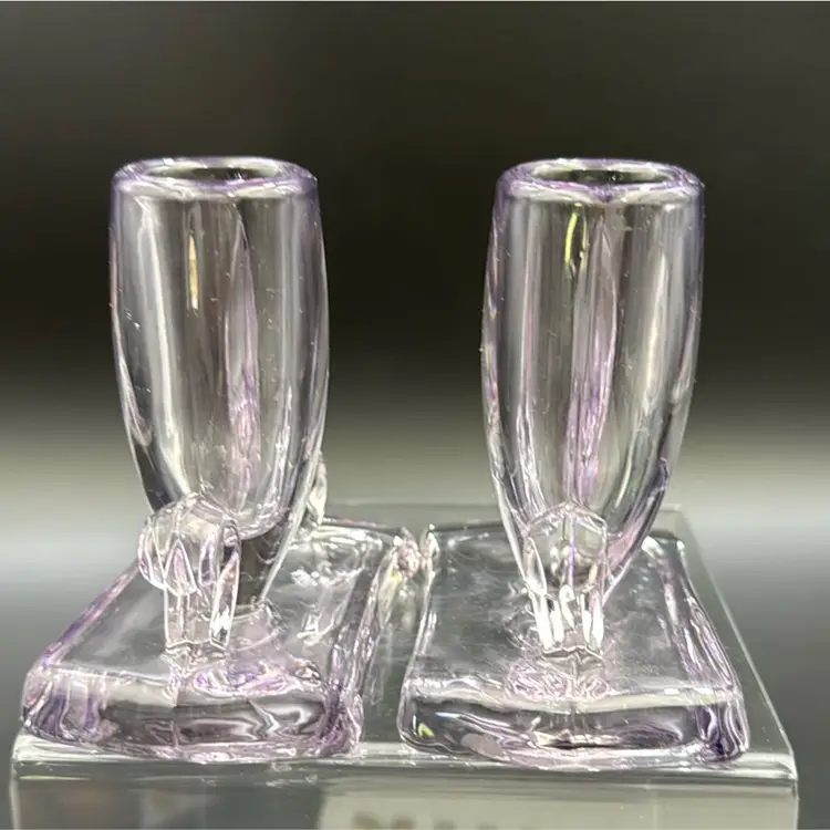 Art Deco American Glass Candle Holders and they have a few of lavender and color has some green glow with UV light
