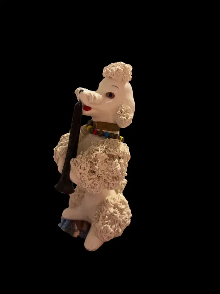 White Spaghetti Poodle Figurine Playing a Clarinet