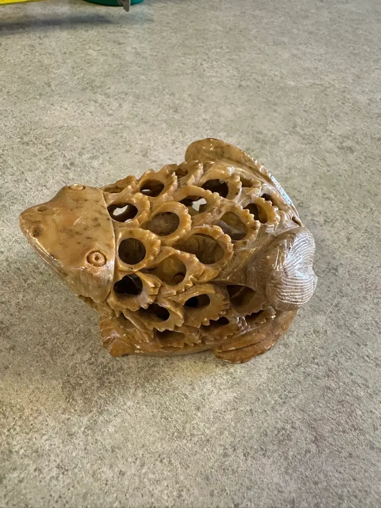 Soapstone sculpture of a Frog with intricate openwork carving