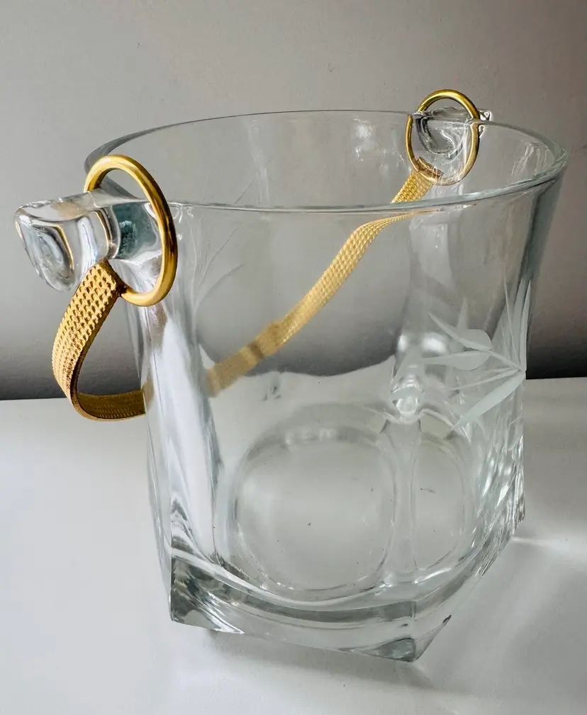 Beautiful Crystal Champaign and/or Ice Bucket
Gold Coloured Handle