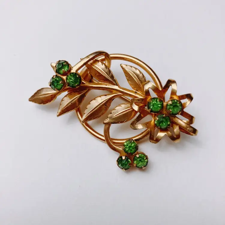 Mid Century Gold Tone Green Rhinestone Floral Brooch Prong Set 1950s Openwork