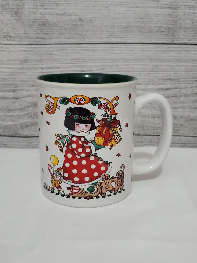 ME Ink Mary Engelbreit Andrews McMeel Publishing Joy Girl Christmas Mug Cup