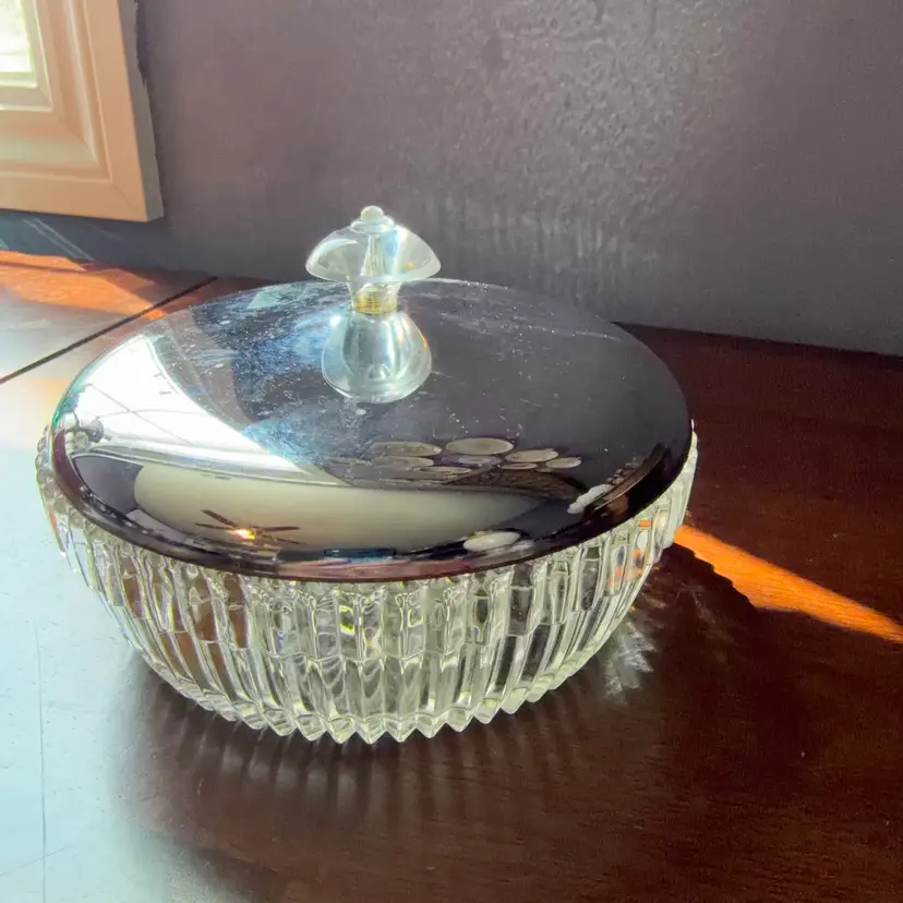 Vintage pressed glass condiment dish with a chrome lid. 5.5” X 4” Tall