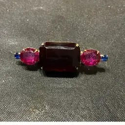 Pink, Blue And Red Brooch. Measures 2.25”x.75”