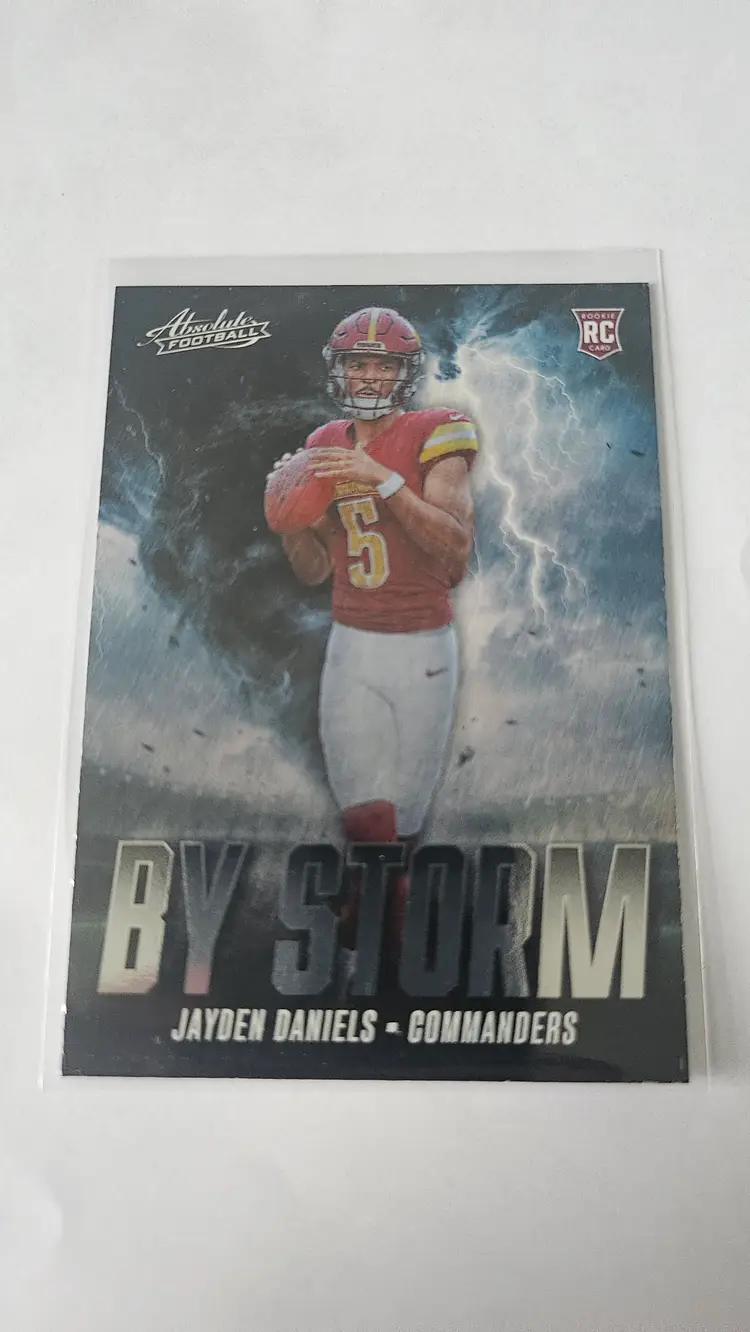 2024 Panini Absolute Football Jayden Daniels By Storm Insert RC #BS-JDS