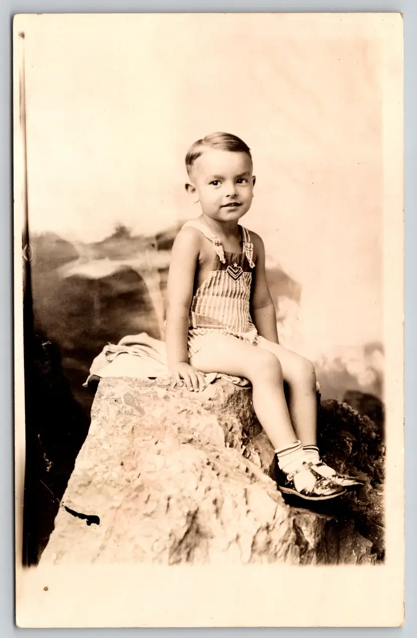 Postcard RPPC Boy in Overalls Sitting on Rock Real Photo Military Insignia  - 9111