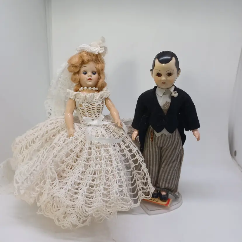 Vintage MCM Celluloid Blinky eye bride and groom 8-in dolls hand crocheted dress