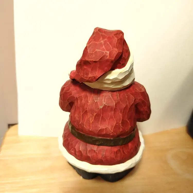 Santa figurine with star.  No condition issues.