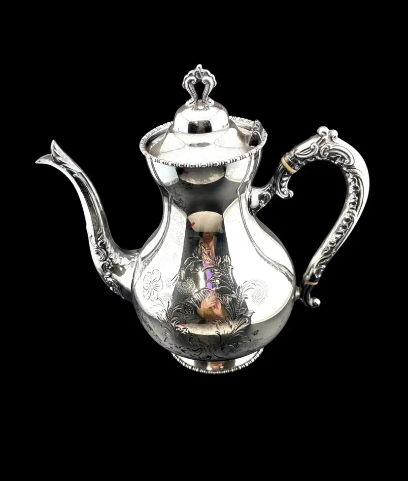 Vintage Silver Plated Middleton Teapot with beautiful embossed details - 10" tall x 9" wide at the handle