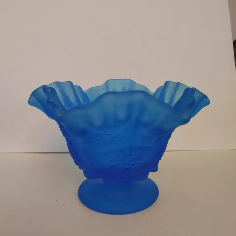 Westmoreland Blue Satin Milk Glass Ruffled Compote Dish with grape leaf pattern. 6.5w x 4.25h x 6.5d. No chips or cracks.