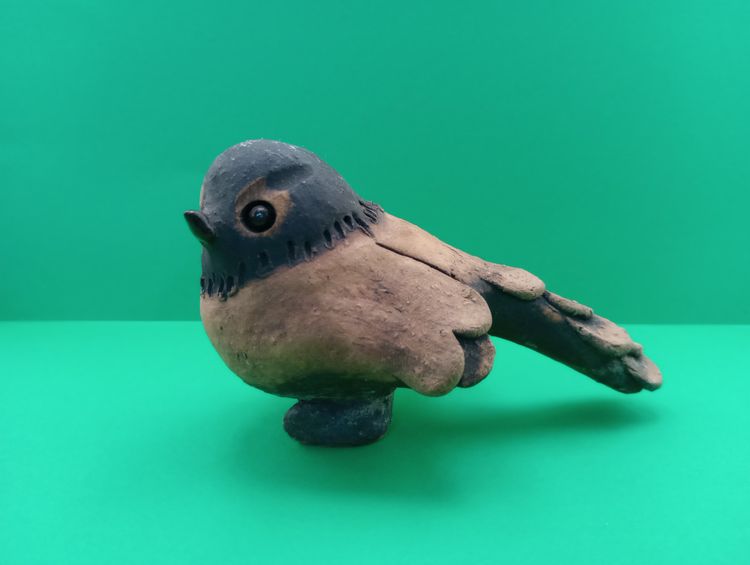 Earthenware studio pottery bird, signed