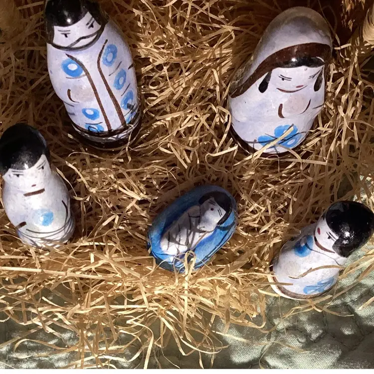 Porcelain nativity scene in a basket