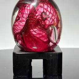 Robert Held Cranberry Swirl Glass Paperweight