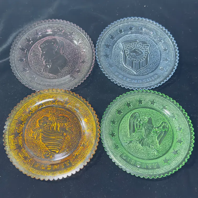 #1264 Vtg Pressed Glass Set of 4 Different Colored Pressed Glass 4" embossed dishes plates